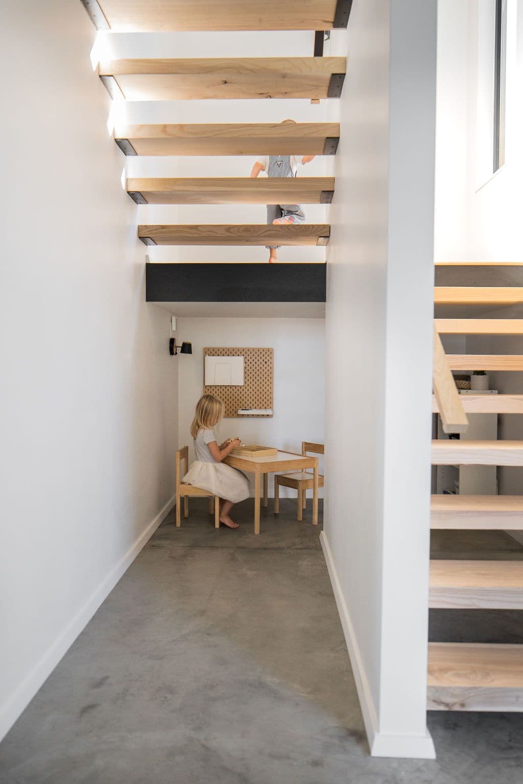 custom reading nook under the stairs